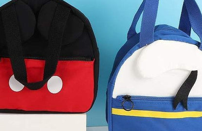 MINISO x Micky Mouse Collaboration product: Micky and Donald Duck backpacks in front of blue wall