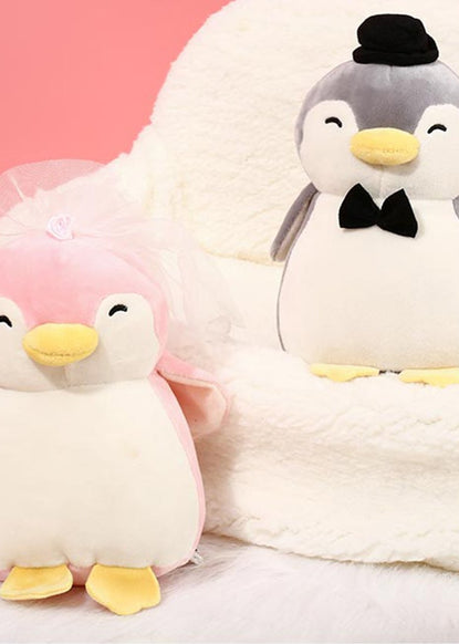bride and groom penguin plushies