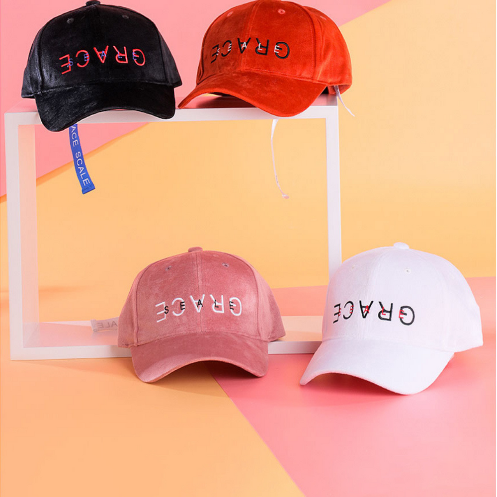 hats with the word GRACE upside down