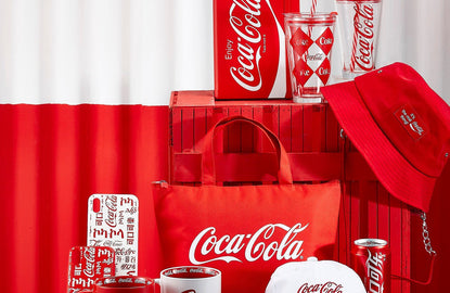 MINISO x Coca-Cola collaboration collection product: hat, mugs, phone cases, portable cups with lids