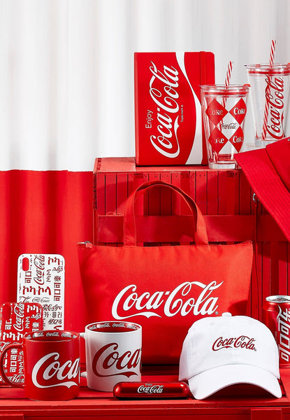 MINISO x Coca-Cola collaboration collection product: hat, mugs, phone cases, portable cups with lids