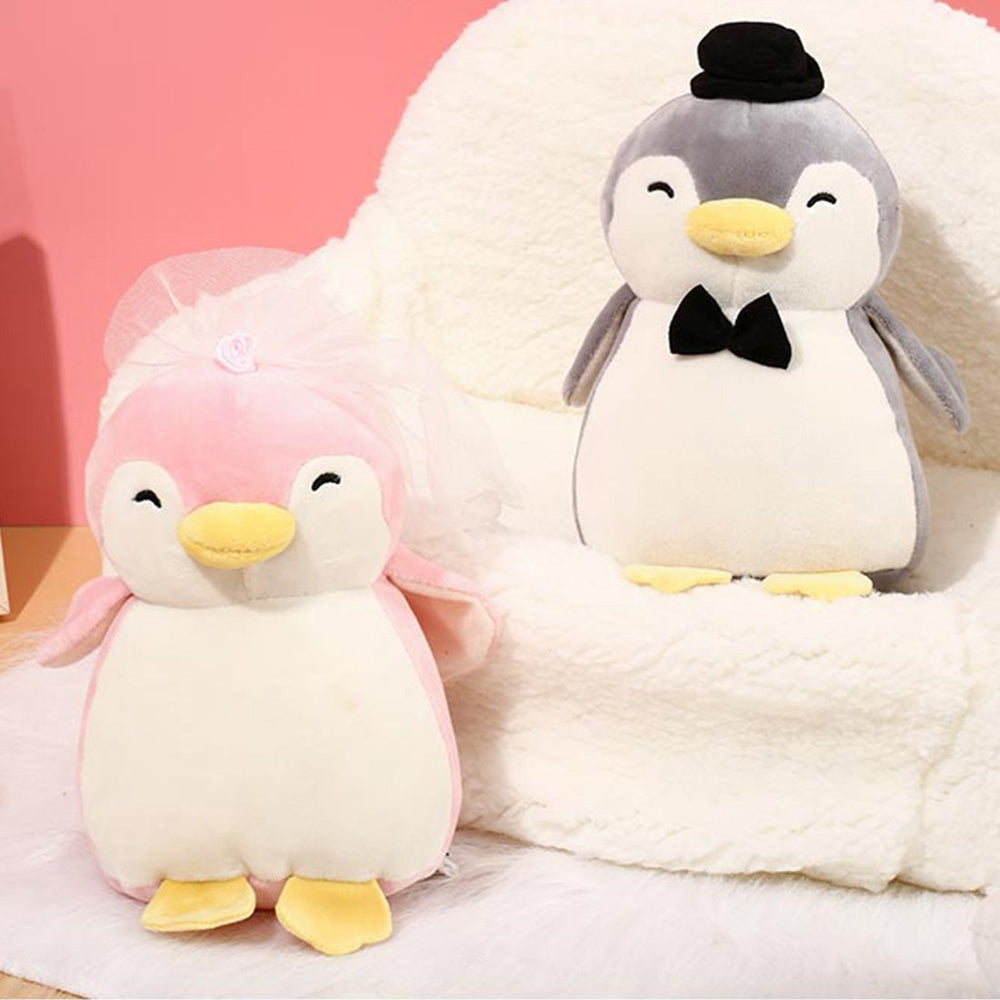 bride and groom penguin plushies