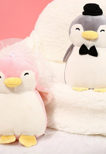 bride and groom penguin plushies