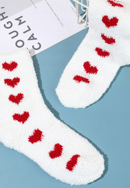 fuzzy white socks with red hearts