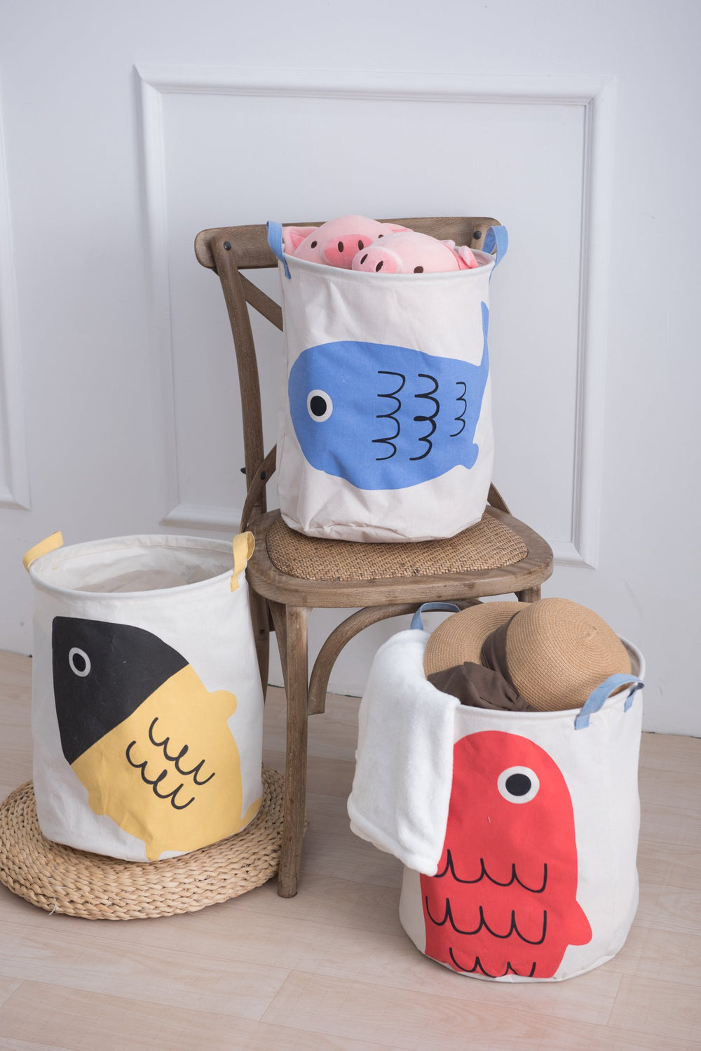 MINISO Ocean collection: laundry baskets with fish, one blue fish, one red fish, one yellow and black fish