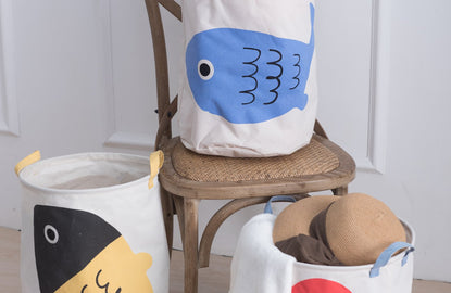MINISO Ocean collection: laundry baskets with fish, one blue fish, one red fish, one yellow and black fish