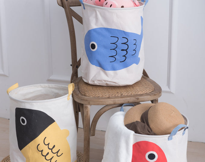MINISO Ocean collection: laundry baskets with fish, one blue fish, one red fish, one yellow and black fish